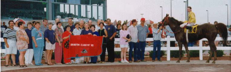 [Johnston High School Class of 1962 in the Winners Circle with Saucey Pie]